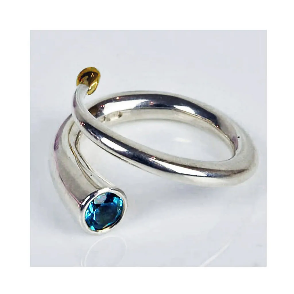 Silver spiral wiggly ring with blue topaz & 18K gold detail